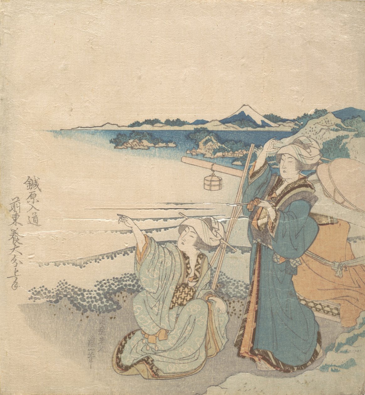 Två unga damer på stranden, en pekar. av Katsushika Hokusai