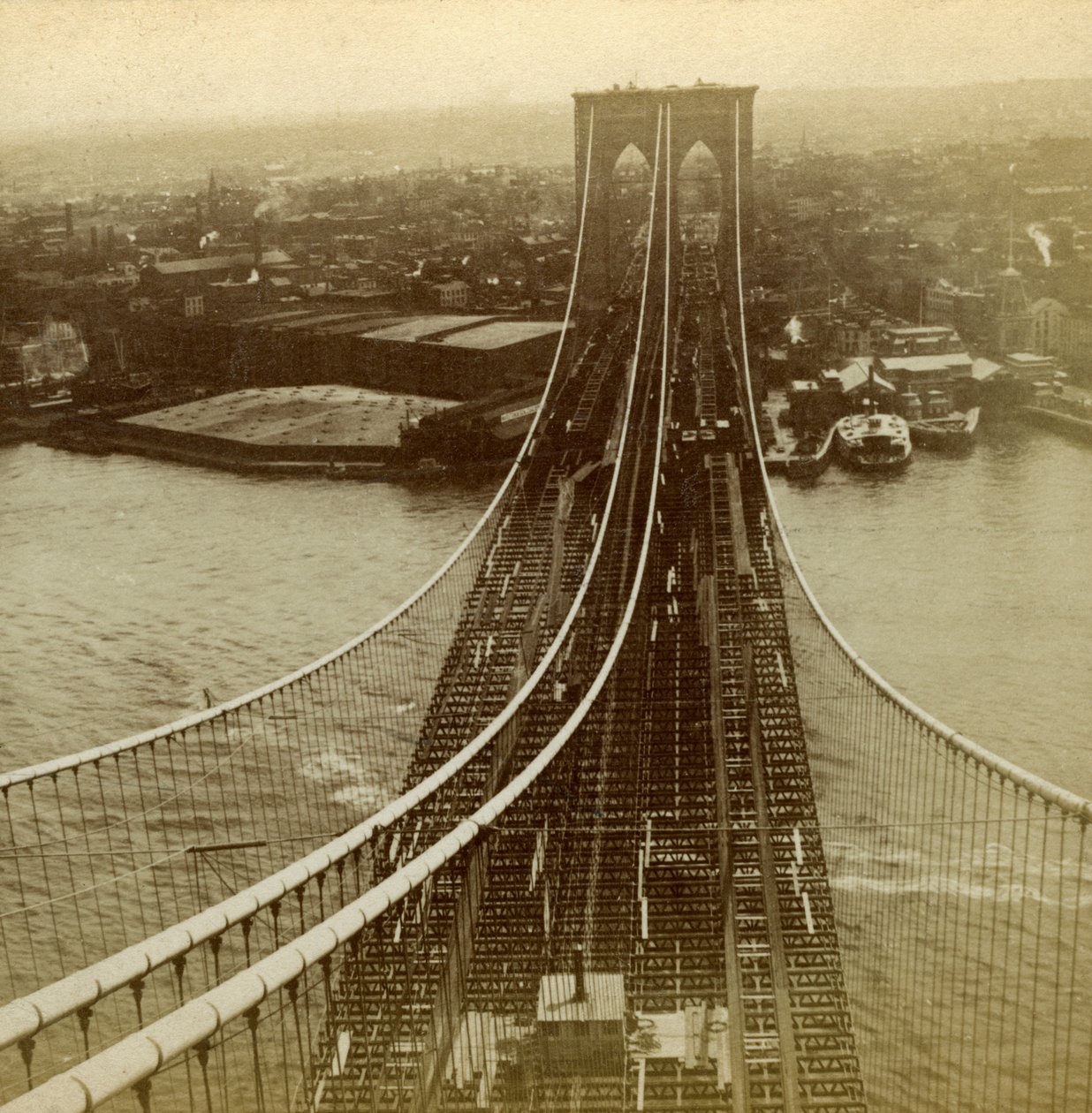 Brooklyn från ett av tornen på hängbron, New York, USA. av Kilburn Brothers