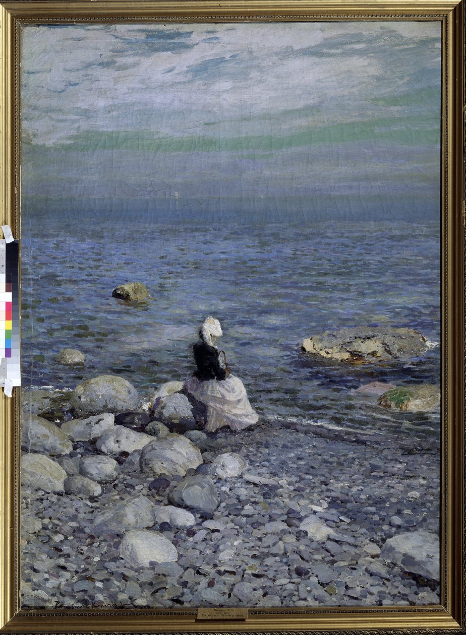 På stranden av Svarta havet (vid Svarta havets kust). En ensam, elegant kvinna, sittande på strandens klippor, tittar på horisonten över havet Målning av Konstantin Alexeyevich Korovin (Constantin Korovin) (1861-1939), olja på duk, cirka 1890. av Konstantin Alekseevich Korovin