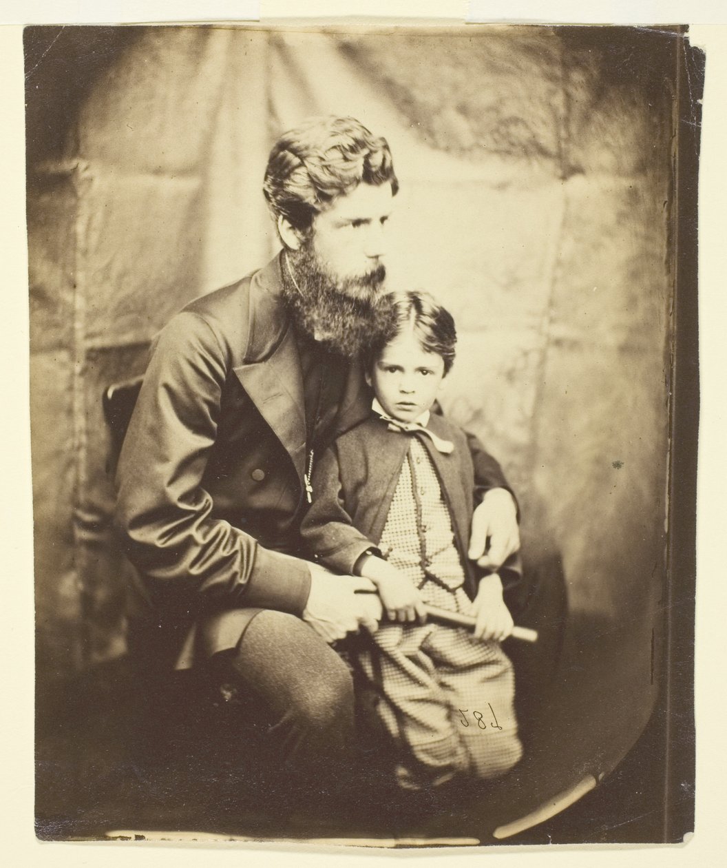 Pastor James Langton Clark och sonen Charles (Robin) av Lewis Carroll