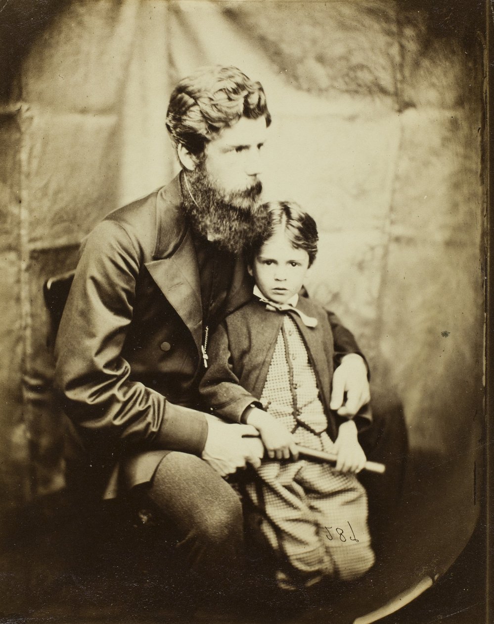 Pastor James Langton Clark och son Charles av Lewis Carroll
