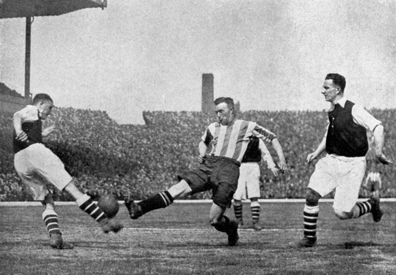 Action från en fotbollsmatch mellan Arsenal och Sheffield United, c1927-1937. av London News Agency