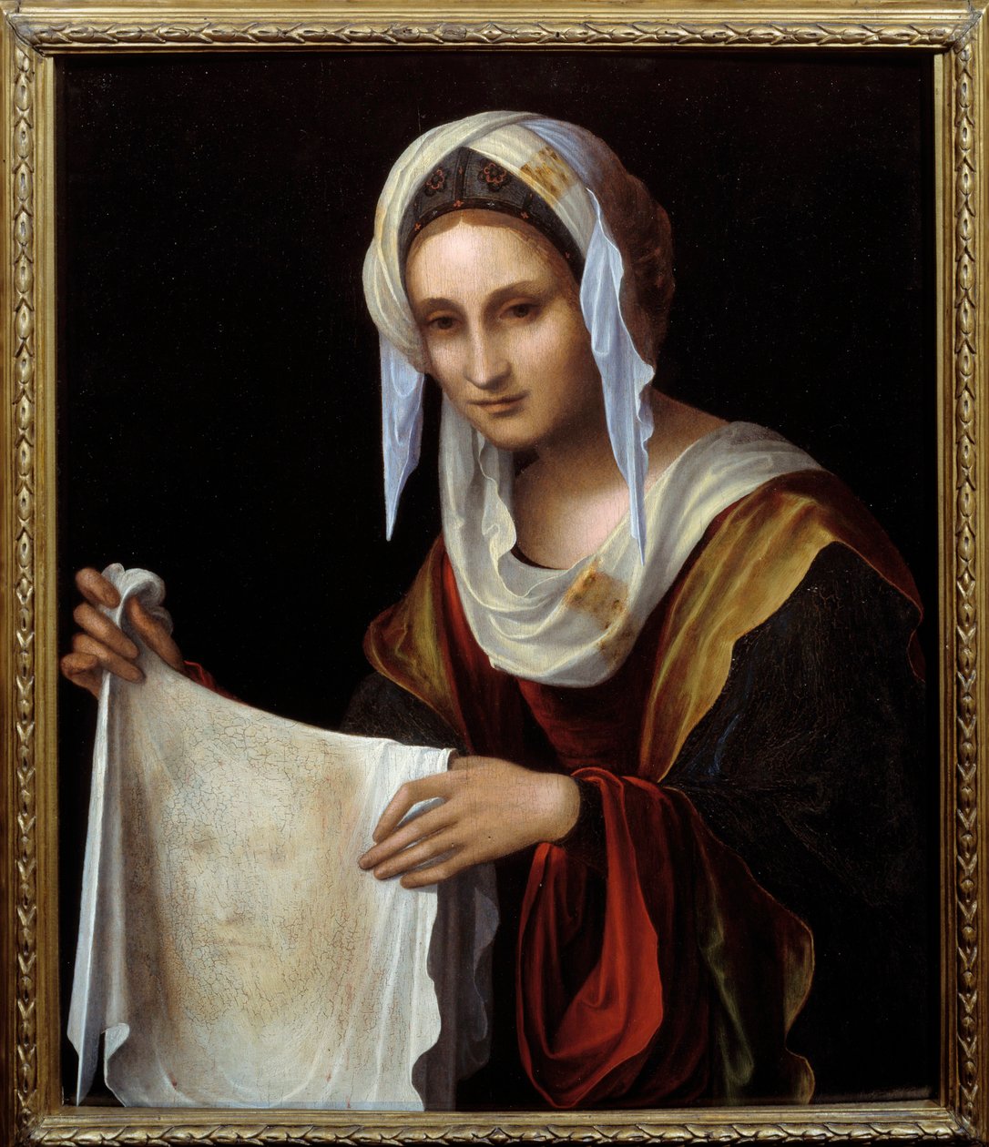 Sankta Veronica. Den heliga slöjan representerar Kristi ansikte vars svett Veronique sades ha varit svettig under stigningen till Golgata. Målning av Lorenzo Costa (1460-1535) Sön. 0,64x0,54 m av Lorenzo Costa