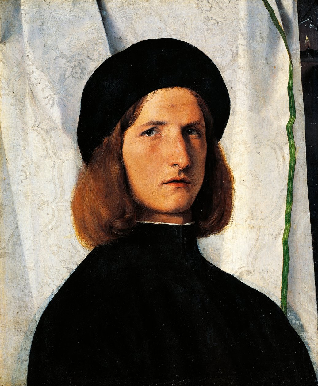 Porträtt av ung man med lampa av Lorenzo Lotto