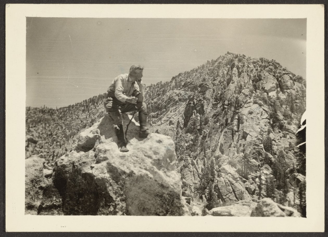 [Man Atop Rocks] av Louis Fleckenstein