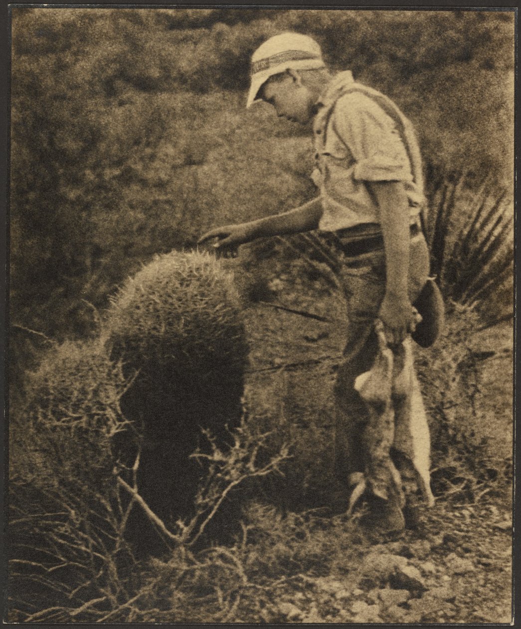 [Man med jackrabbits] av Louis Fleckenstein