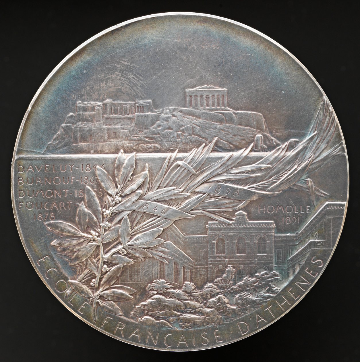 Franska skolan i Aten [omvänd], 1898. av Louis Oscar Roty