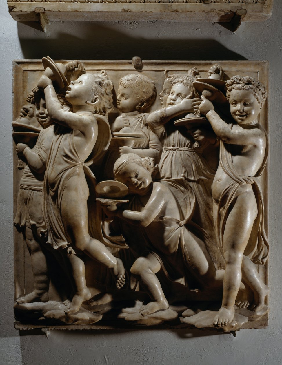 Prisa honom med jubelcymbalerna (Psalm 150, Prisa Herren), panel med cymbalspelare av Luca Della Robbia