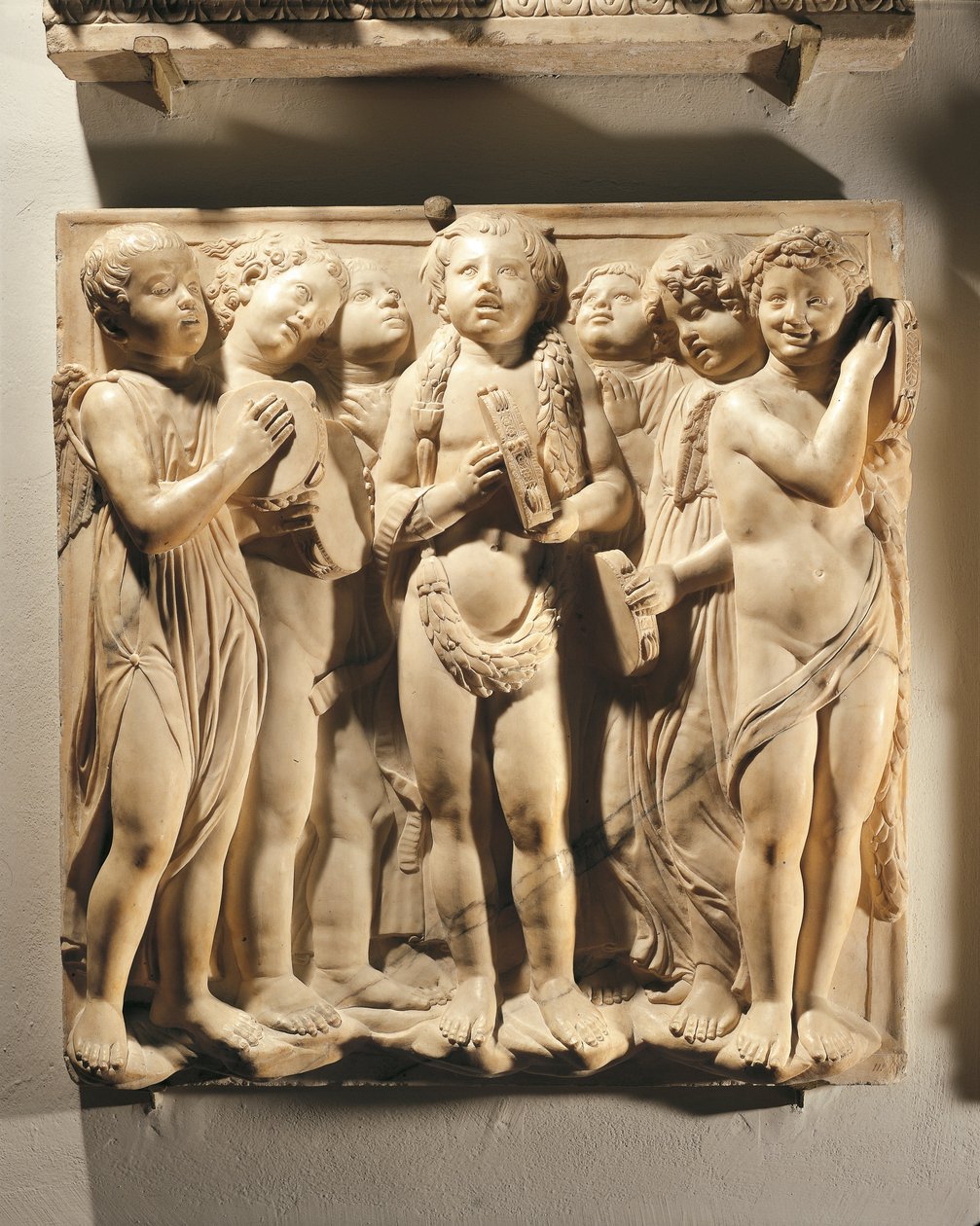 Prisa honom med klingande cymbaler (Psalm 150, Prisa Herren), panel med putti och änglar som spelar cymbaler av Luca Della Robbia