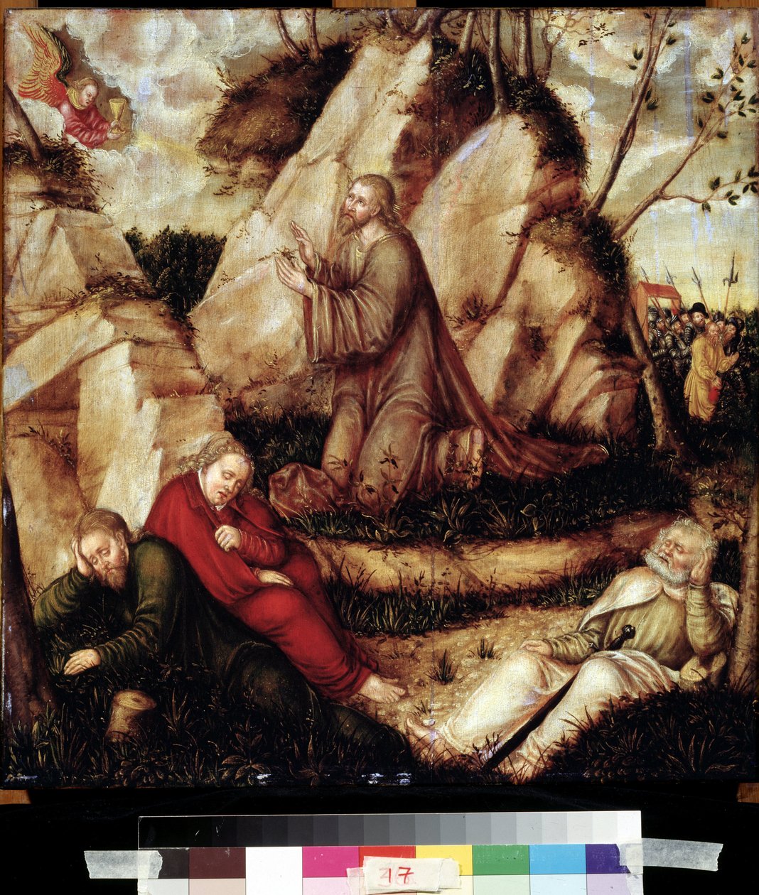 ""Bön i Olivträdgården"" (Agony in the Garden) Efter den sista måltiden går Kristus till Getsemane-kullen som har utsikt över Jerusalem med apostlarna. De romerska soldaterna medhjälpare till Judas närmar sig för att arrestera honom. Målning på trä från L av Lucas the Elder Cranach