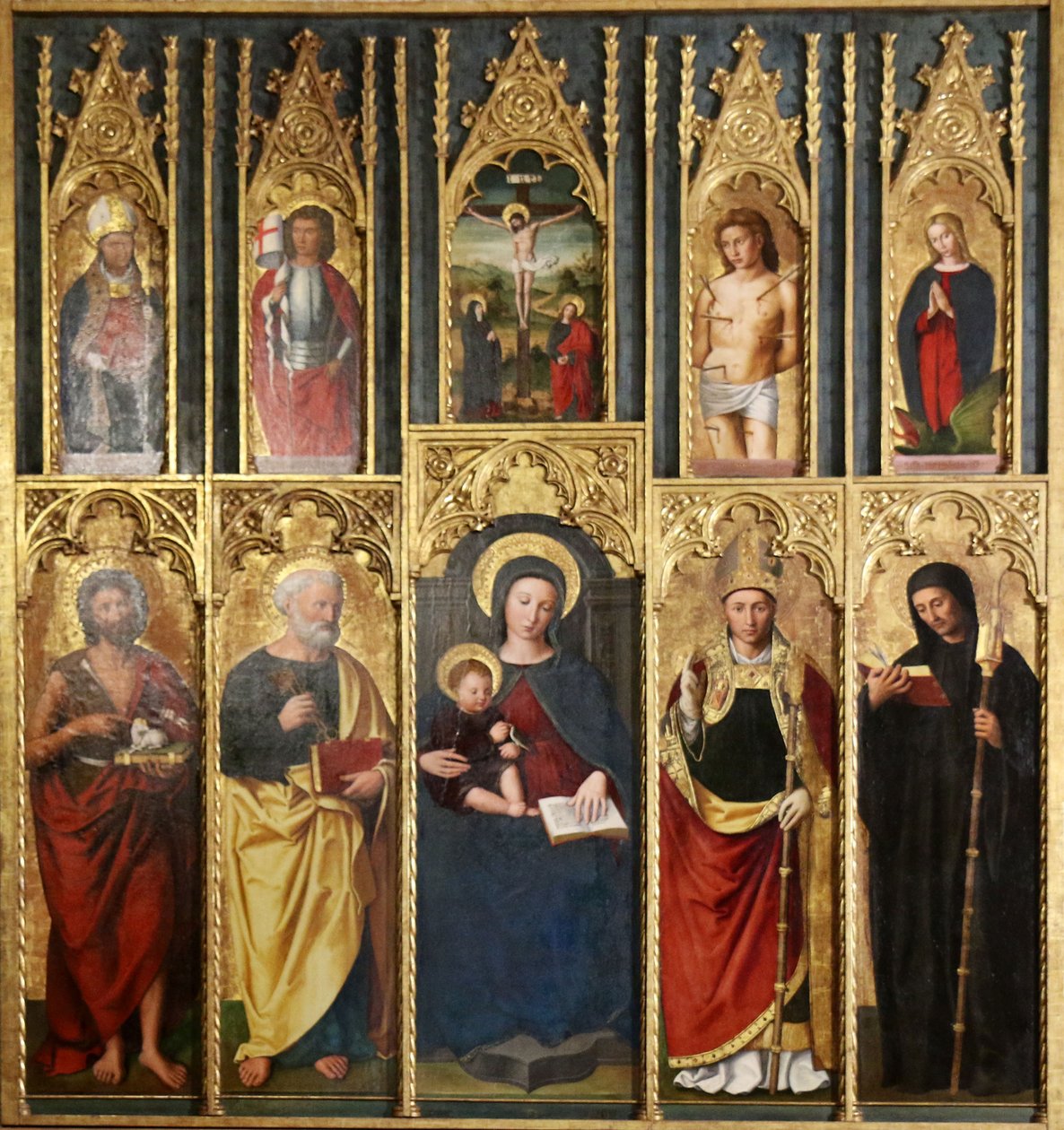 Altartavla, 10 målningar: Jungfru Maria med barnet mellan Johannes Döparen och Petrus, En biskop och en abbot, Kristus på korset mellan Johannes och Jungfrun, Sankt Martin och Sankt Viktor, Sankt Sebastian och Sankt Margareta. av Ludovico Brea