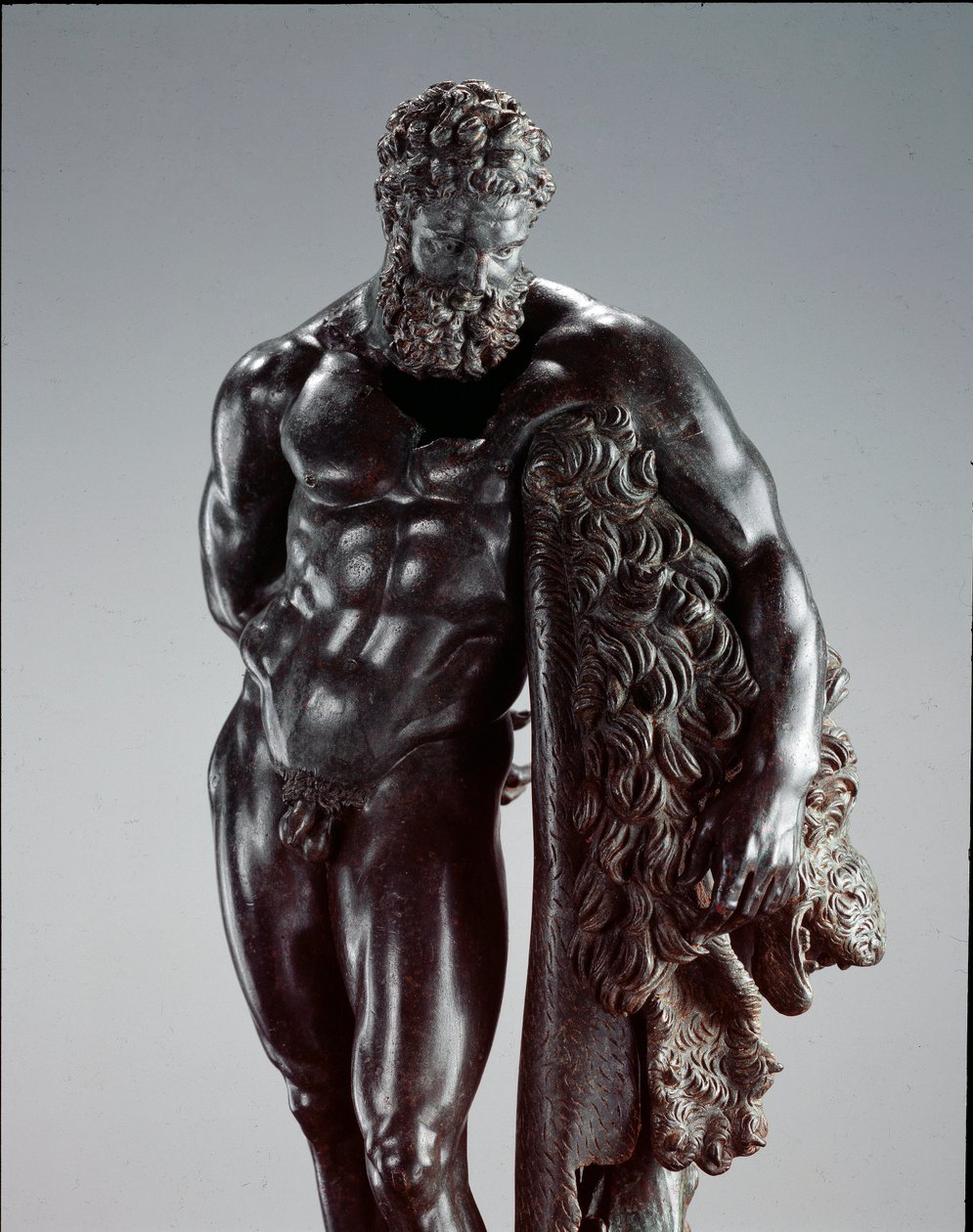 Grekisk konst: "" Herakles i vila "" Detalj. Bronsskulptur av Lysippe av Sicyone (395-305 f.Kr.) 300-talet f.Kr. Från helgedomen Ercole Curino, Sulmona. Nationella arkeologiska museet, Chieti Italien av Lysippos (attributed to)