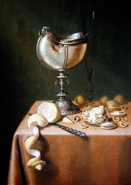 Ett stilleben med en Nautilus-kopp, en skalad citron och valnötter (olja på panel) av Maerten Boelema de Stomme