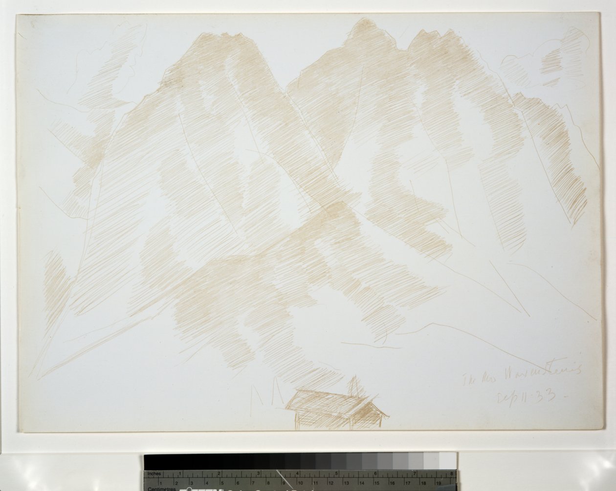 Bergslandskap med byggnader i förgrunden av Marsden Hartley