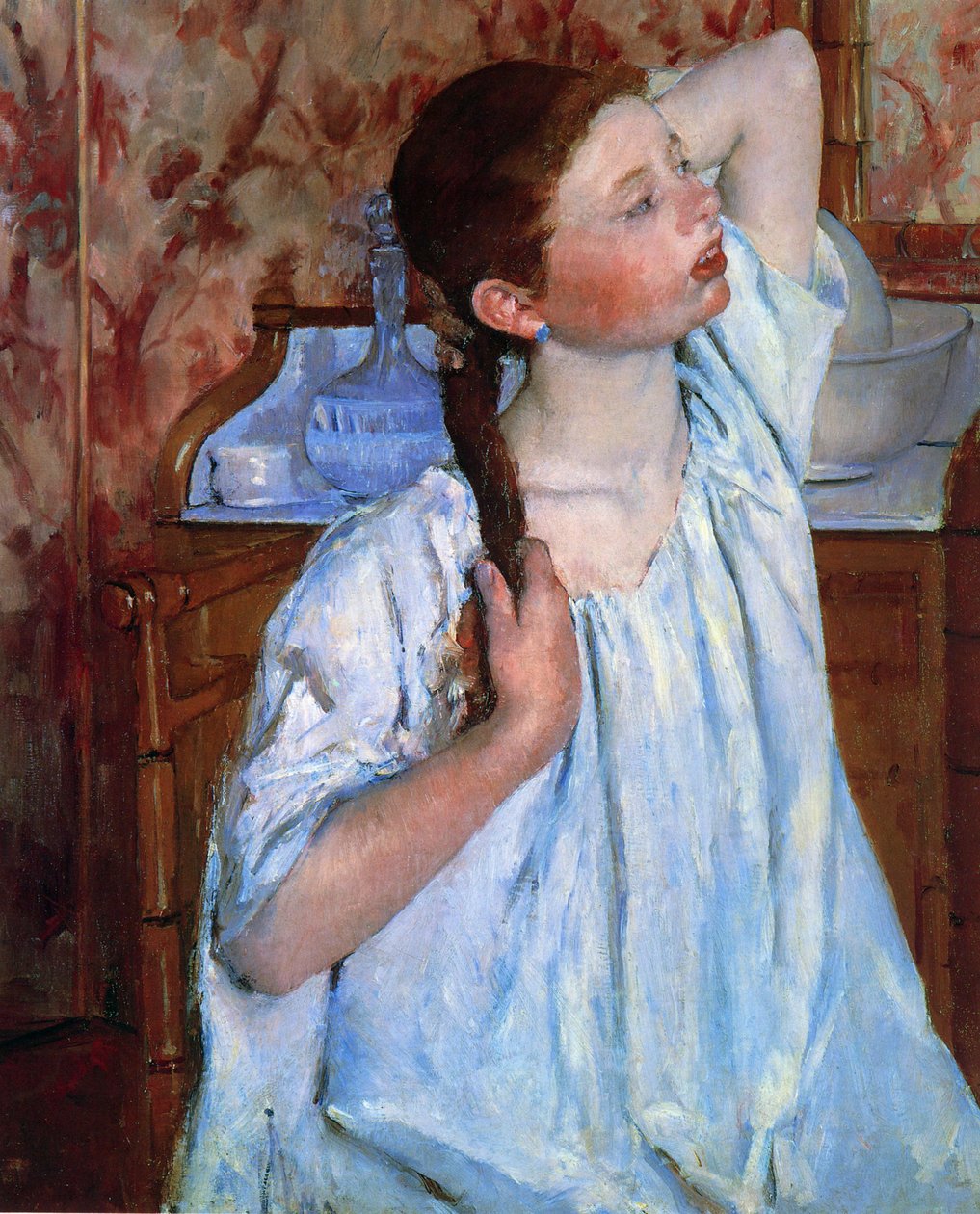 Girl Arranging Her Hair  av Mary Cassatt