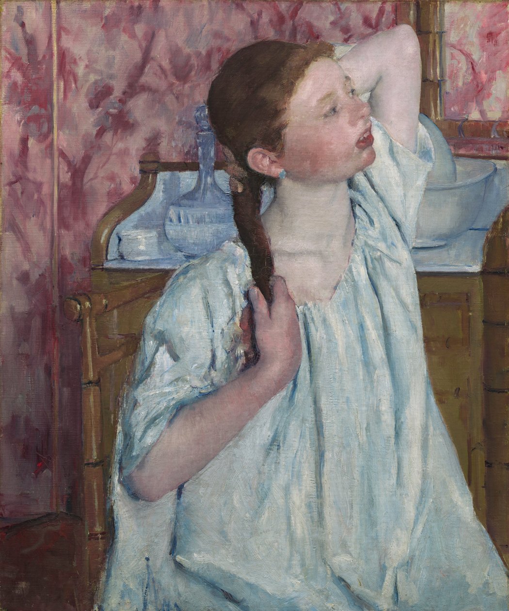 Girl Arranging Her Hair av Mary Cassatt