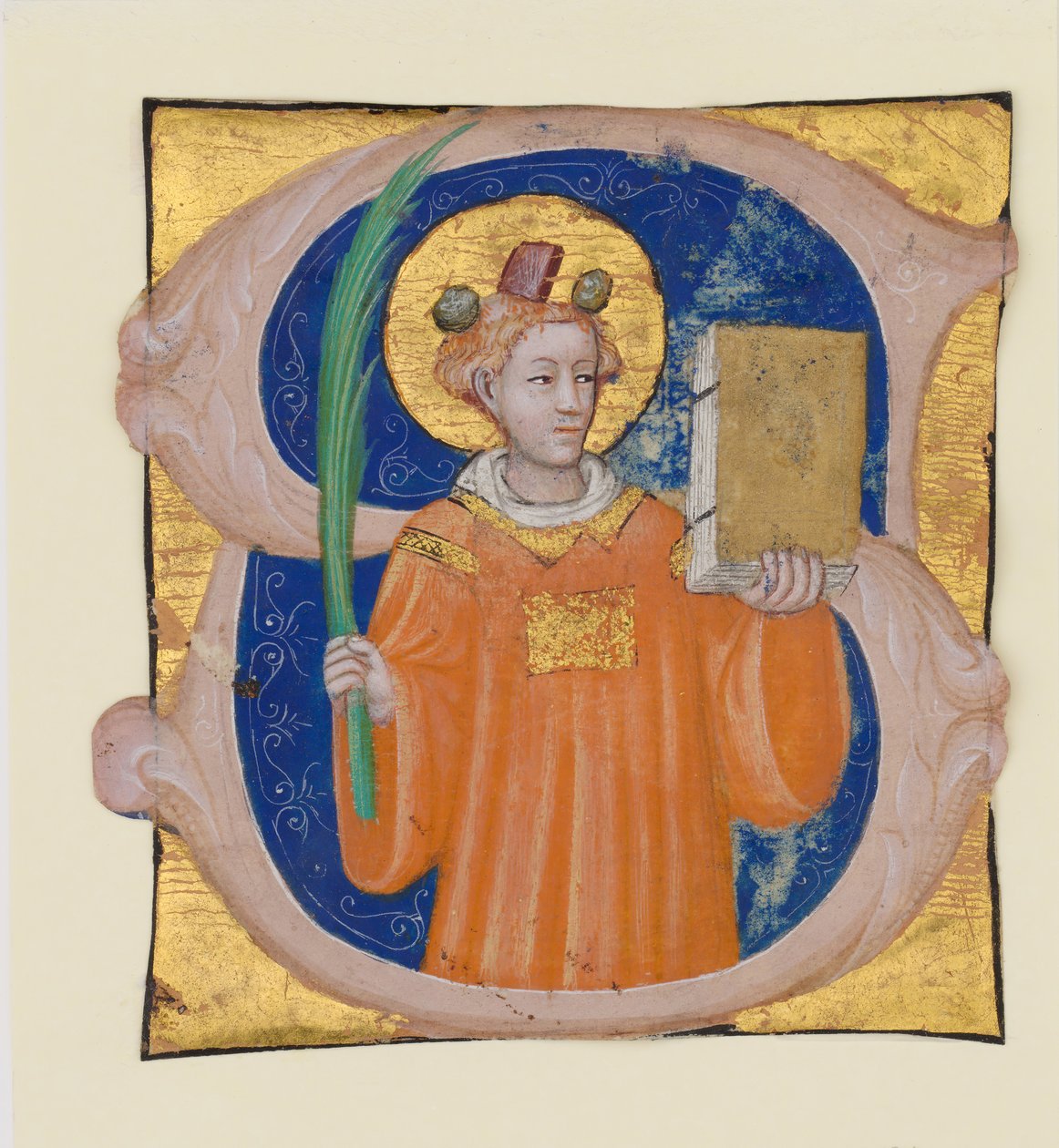 Manuskriptbelysning med Saint Stephen i ett initialt S, från en antifonarium, ca. 1410-20. av Master of the Brussels Initials