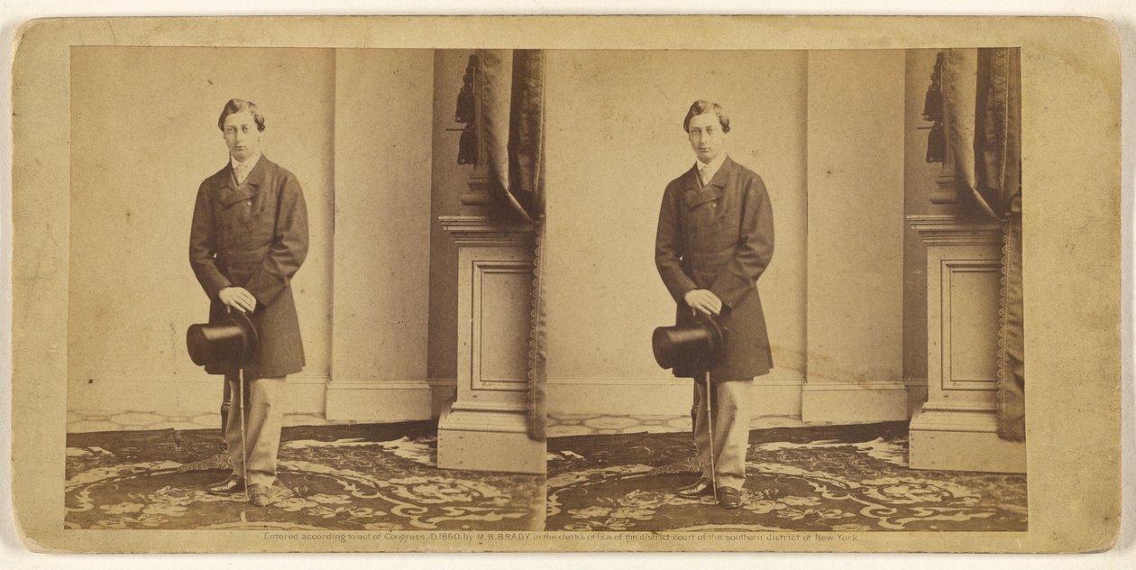 [Oidentifierad ung man stående med hög hatt och käpp] av Mathew B. Brady