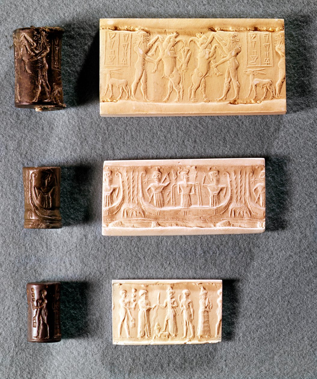 Tre cylindertätningar med avtryck, 1:a årtusendet f.Kr. (metall och gips) av Mesopotamian