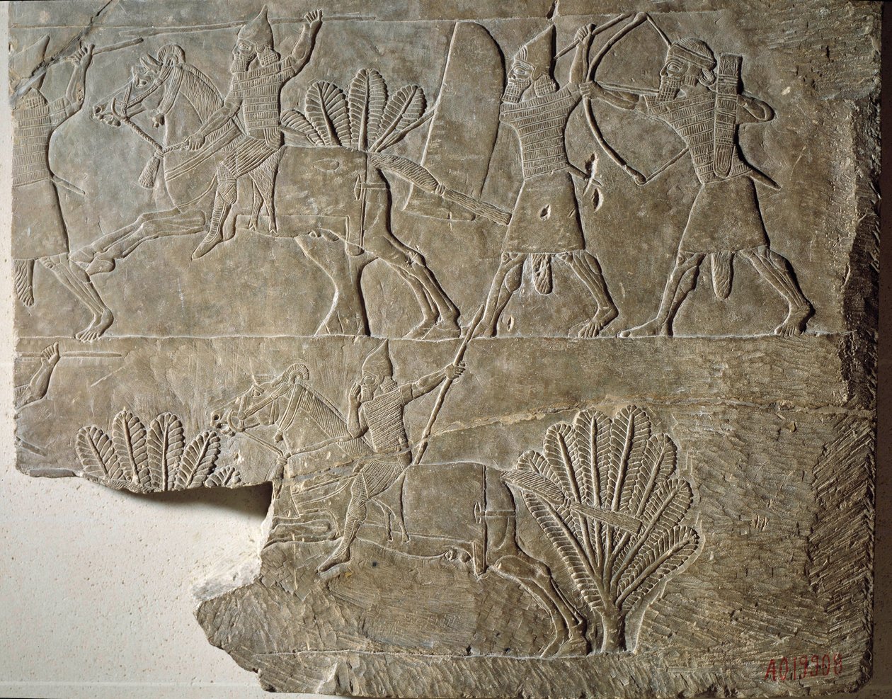 Mesopotamien: Ryttare från den assyriska armén. Lågrelief i alabaster från kung Ashurbanipals (eller Ashurbanipals) palats (668-627 f.Kr.). Från Nineve. Paris, Louvren av Mesopotamian