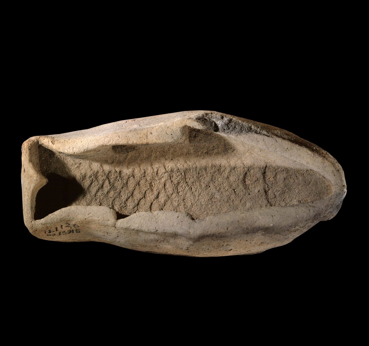 Mesopotami: terrakottaform i form av fisk. Omkring 1800 f.Kr. Från kungliga rätter av kung Zimri Lims palats i Mari. Paris, Louvren av Mesopotamian