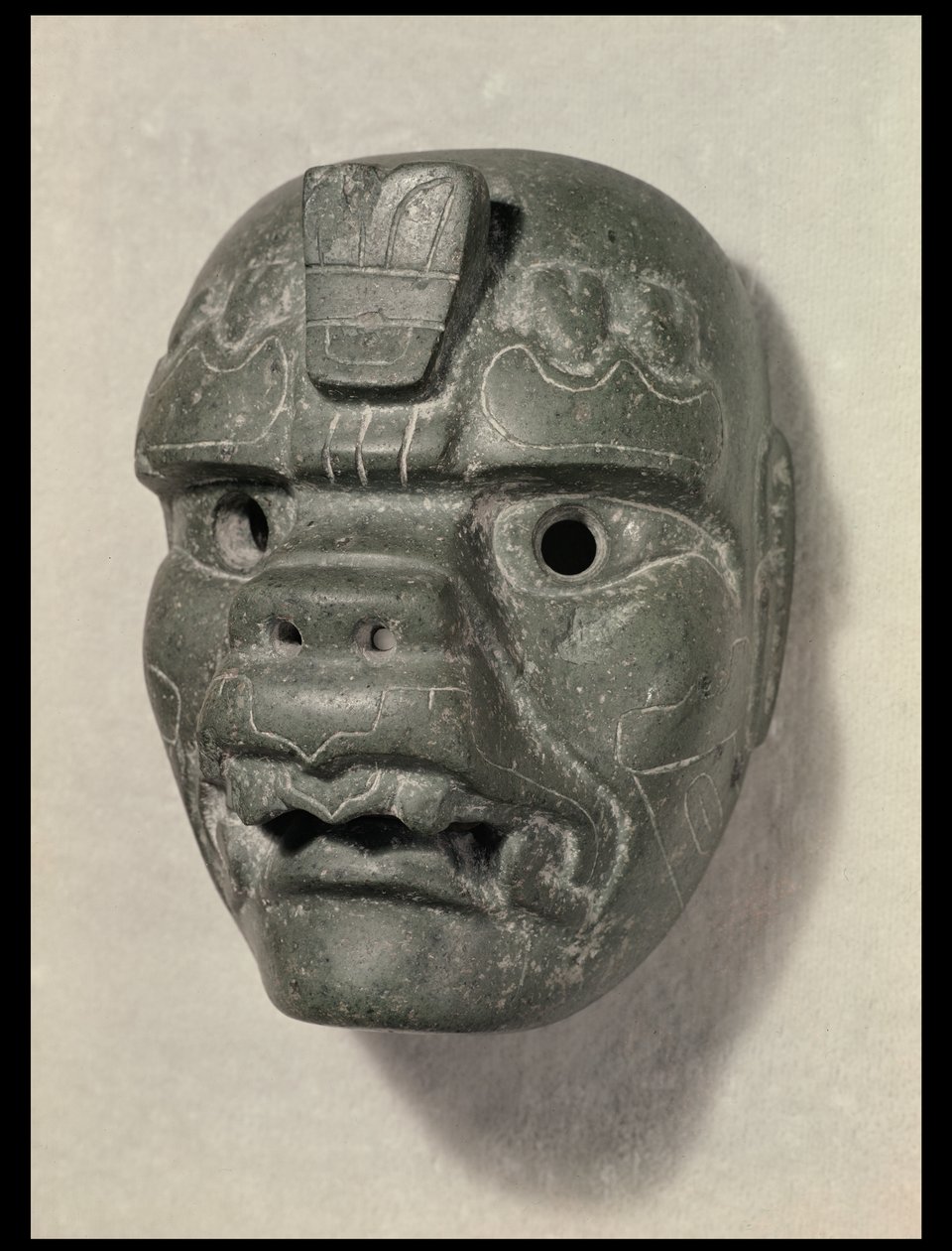 Kattmask av en man, från Oaxaca, Pre-Columbian (jade) av Mexican School