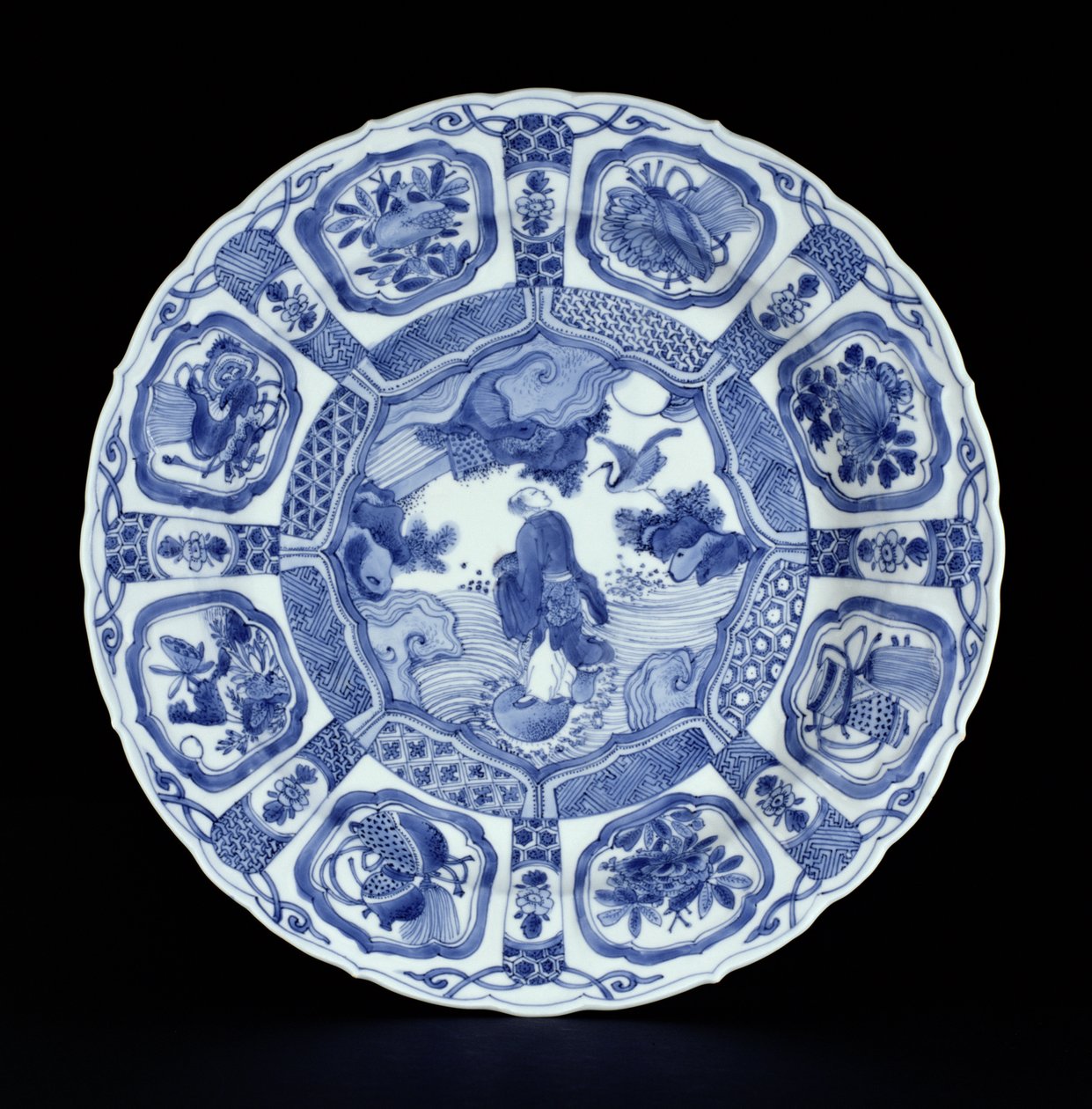 Blått och vitt kraakfat målat med Li Tieguai som korsar havet på en dubbel kalebass, Wanli-period, 1594-1610 (porslin) av Ming Dynasty Chinese School