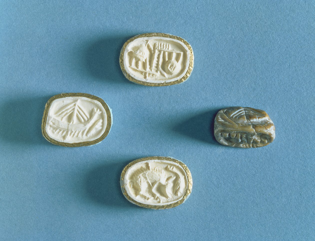 Sigill med tre avtryck från Knossos, tidig minoisk (steatit) av Minoan