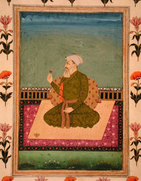 En linjal som sitter på en matta eller terrass, håller i en blomma, från Small Clive Album (ogenomskinlig akvarell på papper) av Mughal School