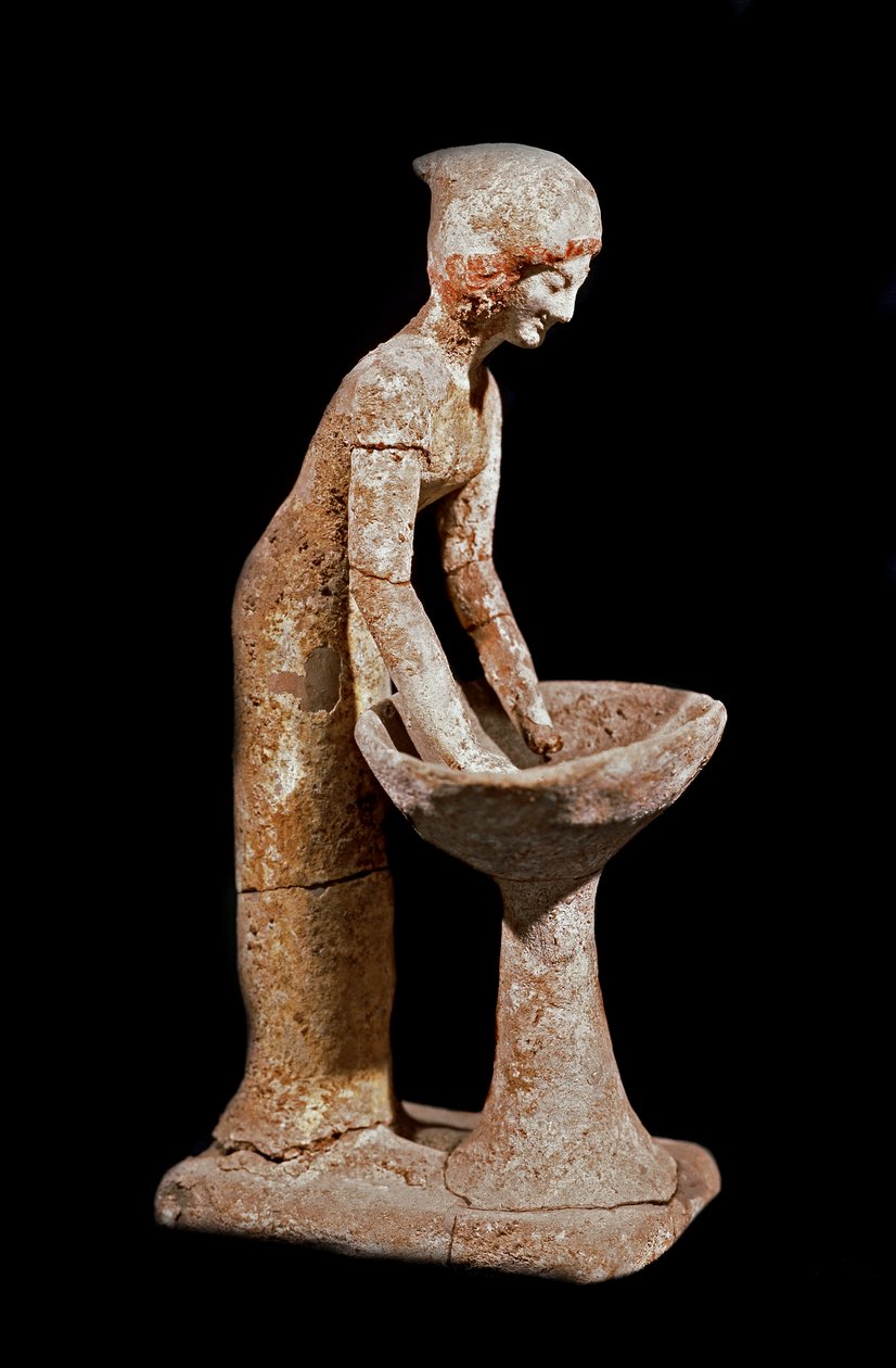Mykensk konst: statyett av kvinna som kikar på mjöl. 1500-talet f.Kr. Strasbourg, arkeologiskt museum av Mycenaean