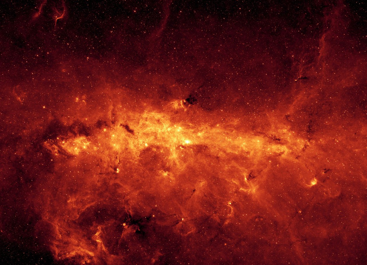 Mitten av Vintergatans galax sedd av Spitzer Space Telescope. Infraröd bild av det galaktiska centrumet och dammiga moln, upplysta av unga massiva stjärnor. Kredit NASA. Vetenskap Astronomi Rymd av National Aeronautics and Space Administration National Aeronautics and Space Administration