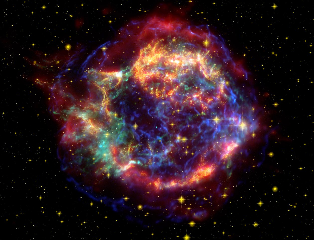 Falskfärgad bild av supernovaresten Cassiopeia A i stjärnbilden Cassiopeia, 10 000 ljusår bort. Det är en rest av en en gång så enorm stjärna som dog i en supernovaexplosion. Kredit NASA. Sci av National Aeronautics and Space Administration National Aeronautics and Space Administration
