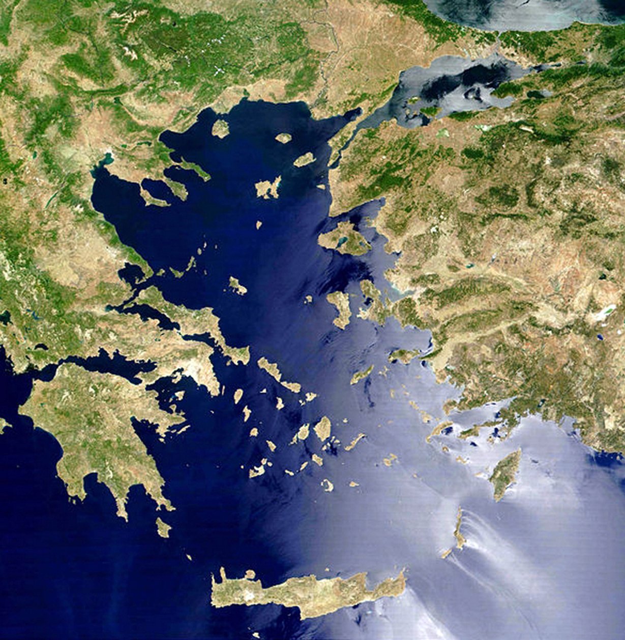 Satellitvy över Egeiska havet: Kreta är ön längst ner i mitten. NASA bild. Vetenskap av National Aeronautics and Space Administration National Aeronautics and Space Administration
