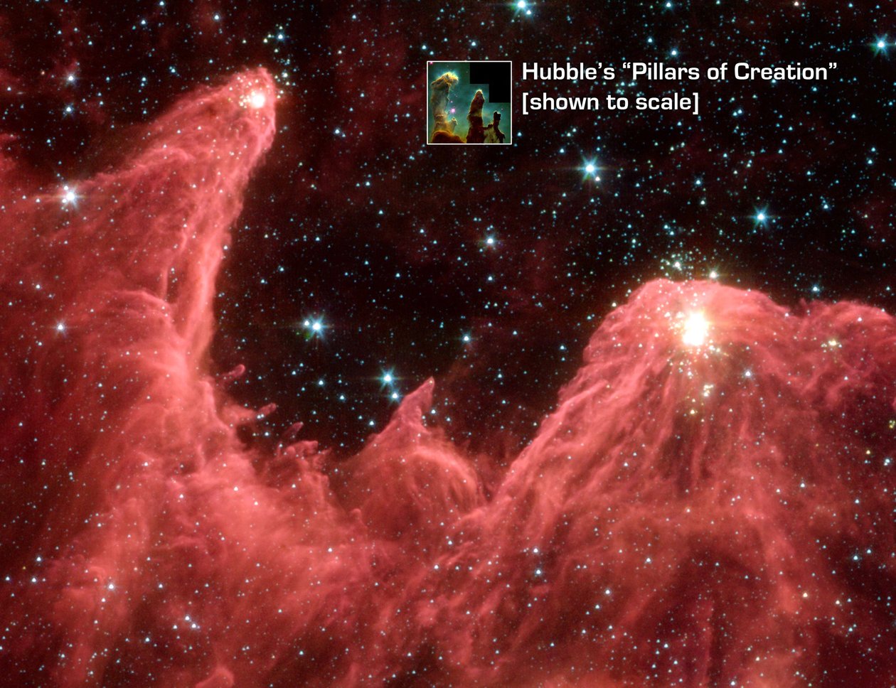 Spitzer Space Telescope bild i falsk färg av berg där stjärnor föds. Dubbade Mountains of Creation är de höga pelarna av sval gas och damm upplysta i spetsarna med ljus från embryostjärnor. C av National Aeronautics and Space Administration National Aeronautics and Space Administration