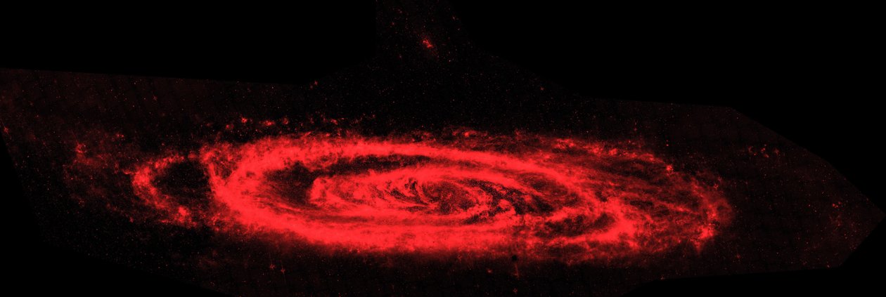 Spitzer Space Telescope infraröda sammansatta bilder hur Andromeda galaxen. Huvudbilden framhäver kontrasten mellan galaxens hackiga vågor av damm (röd) och släta hav av äldre stjärnor. Kredit NASA av National Aeronautics and Space Administration National Aeronautics and Space Administration