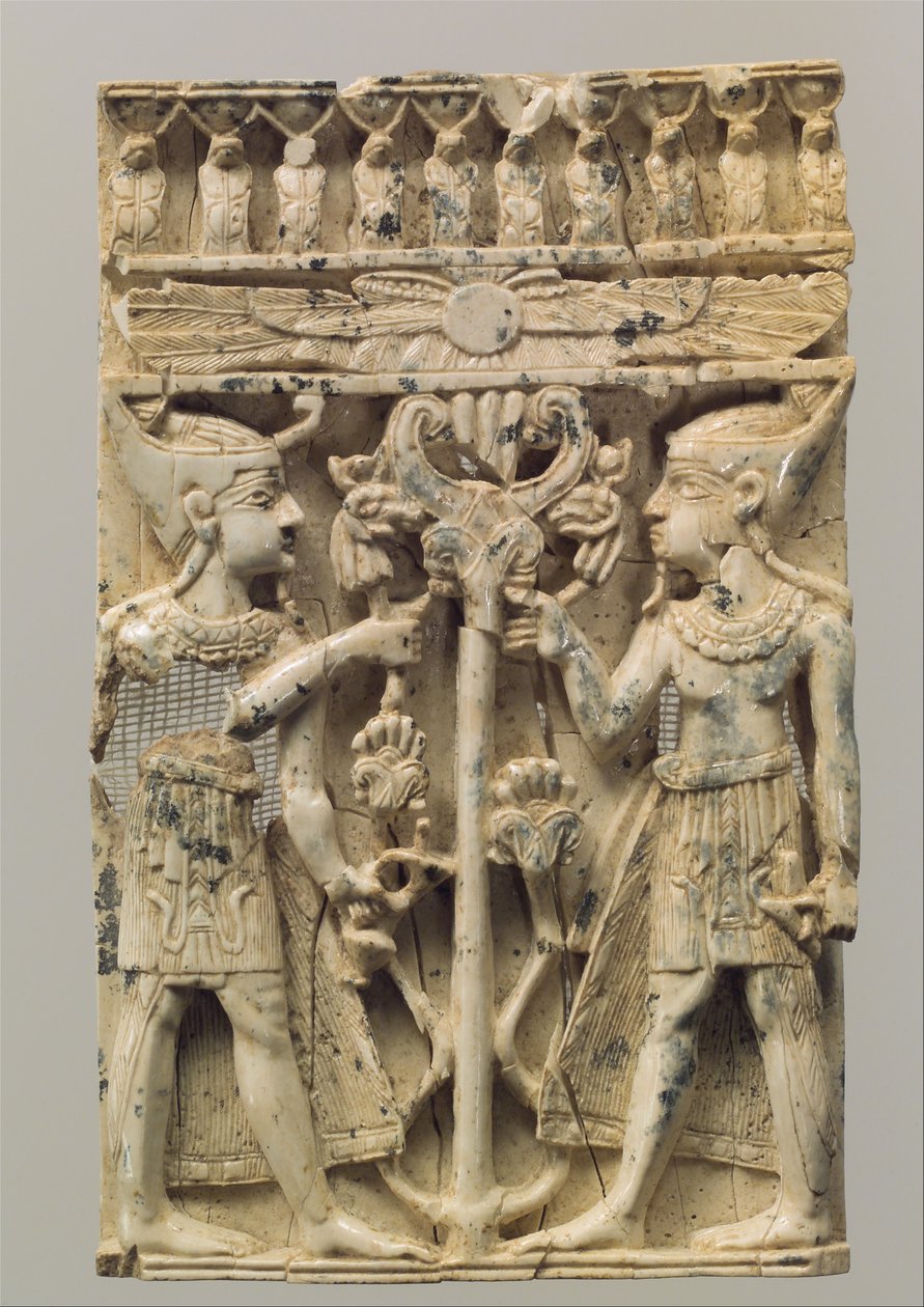 Möbelplakett snidad i hög relief med två egyptiska figurer som flankerar ett volutträd, ca 900-800-talet f.Kr. (elfenben) av Neo Assyrian