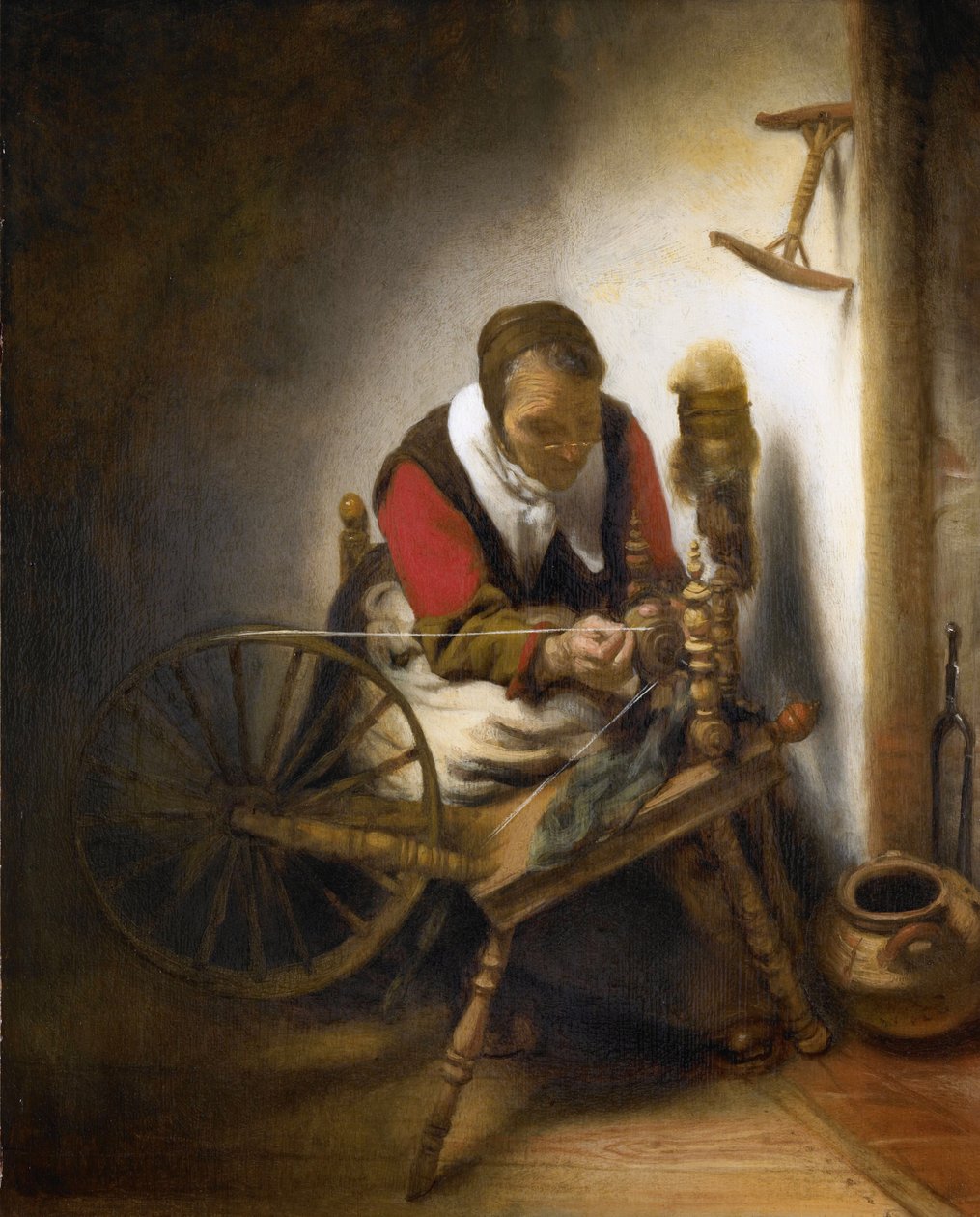 A Woman Spinning.  av Nicolaes Maes