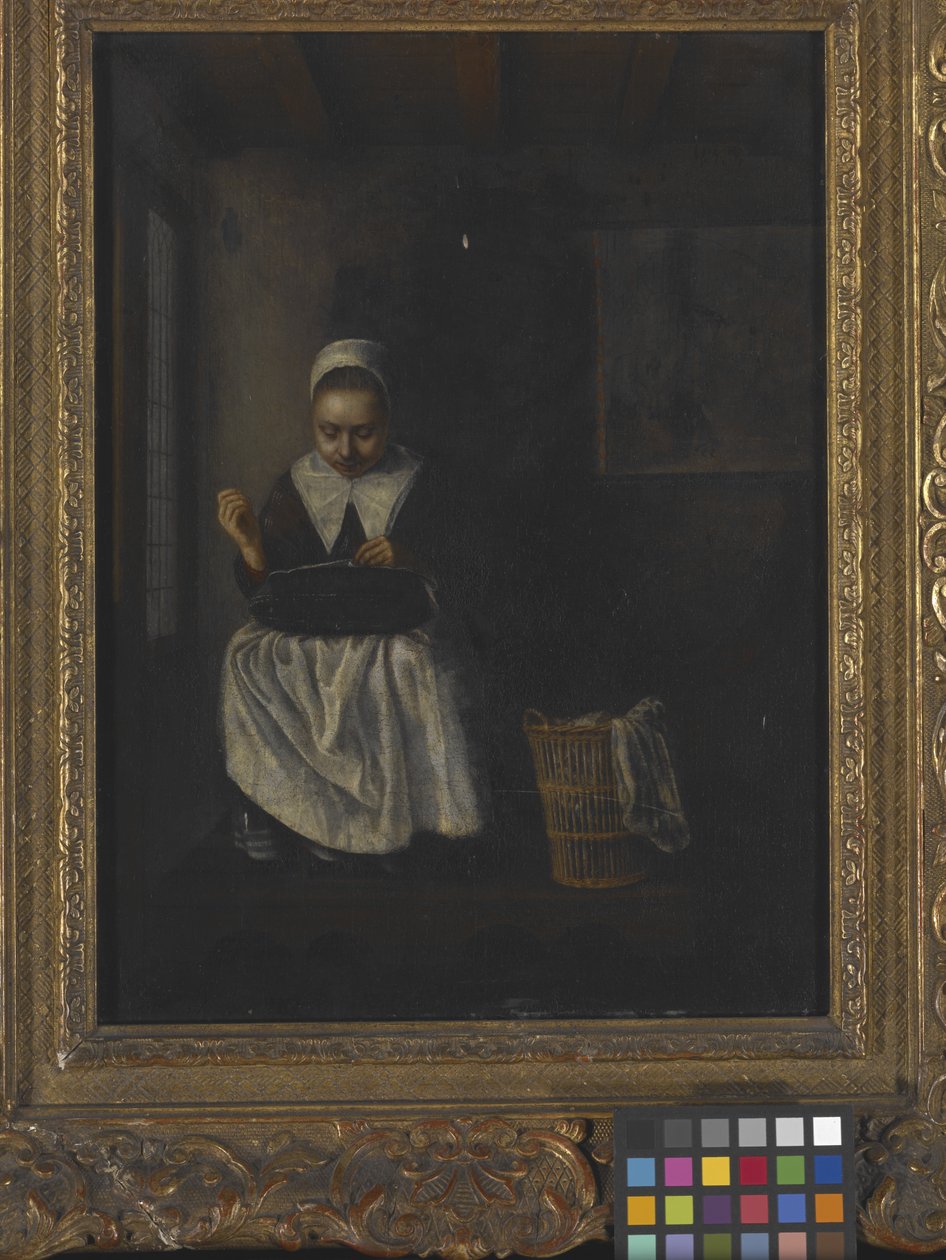 A Girl Sewing (olja på trä) av Nicolaes Maes