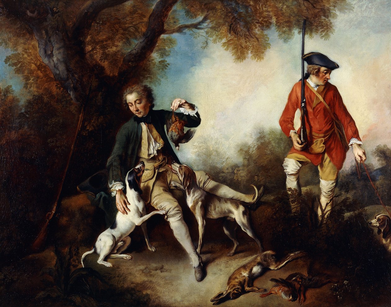 La Halte de Chasseurs": En jägare som håller en viltfågel och vilar vid ett träd, hans tjänare och hundar i närheten, av Nicolas Lancret