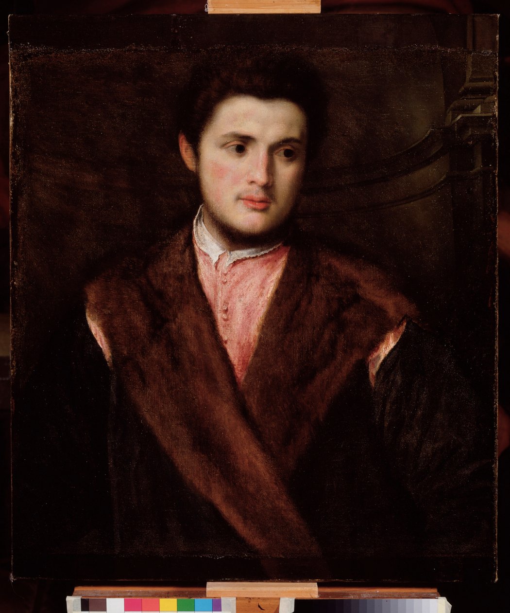 Porträtt av en ung man som bär en päls Målning av Paris Bordon (1500-1571) 1500-talet Dim 75x64 cm Genes Musei di Strada Nuova (ex Palazzo Rosso) av Paris Bordone