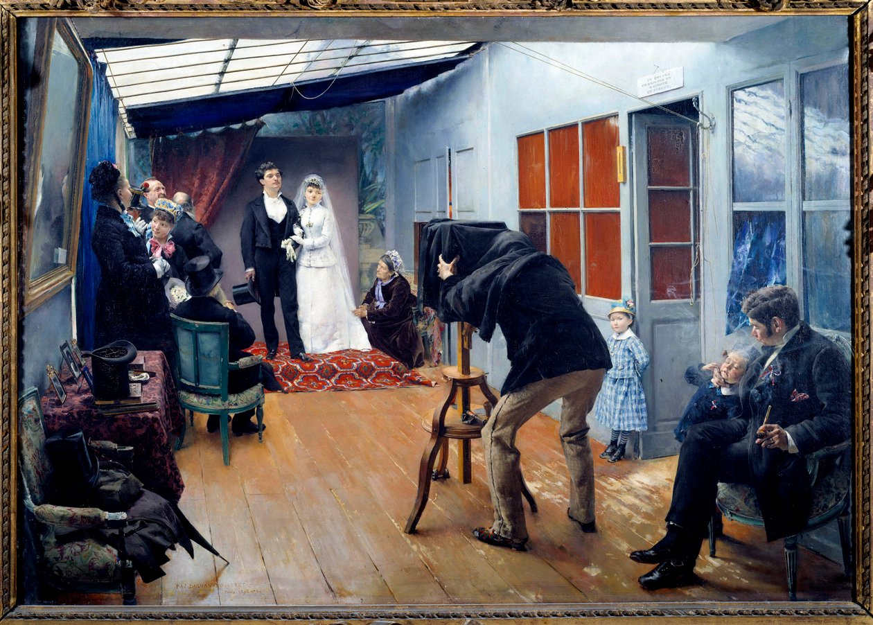 Ett bröllop med fotografen 1879 Ett par unga brudar poserar i fotografstudion. Målning av Pascal Adolphe Jean Dagnan-Bouveret (1852-1929) 1879 sön. 0,85x1,22 m Lyon, musee des Beaux Arts - Bröllopsfest i fotografens studio av Pascal Adolphe Jean Dagnan Bouveret