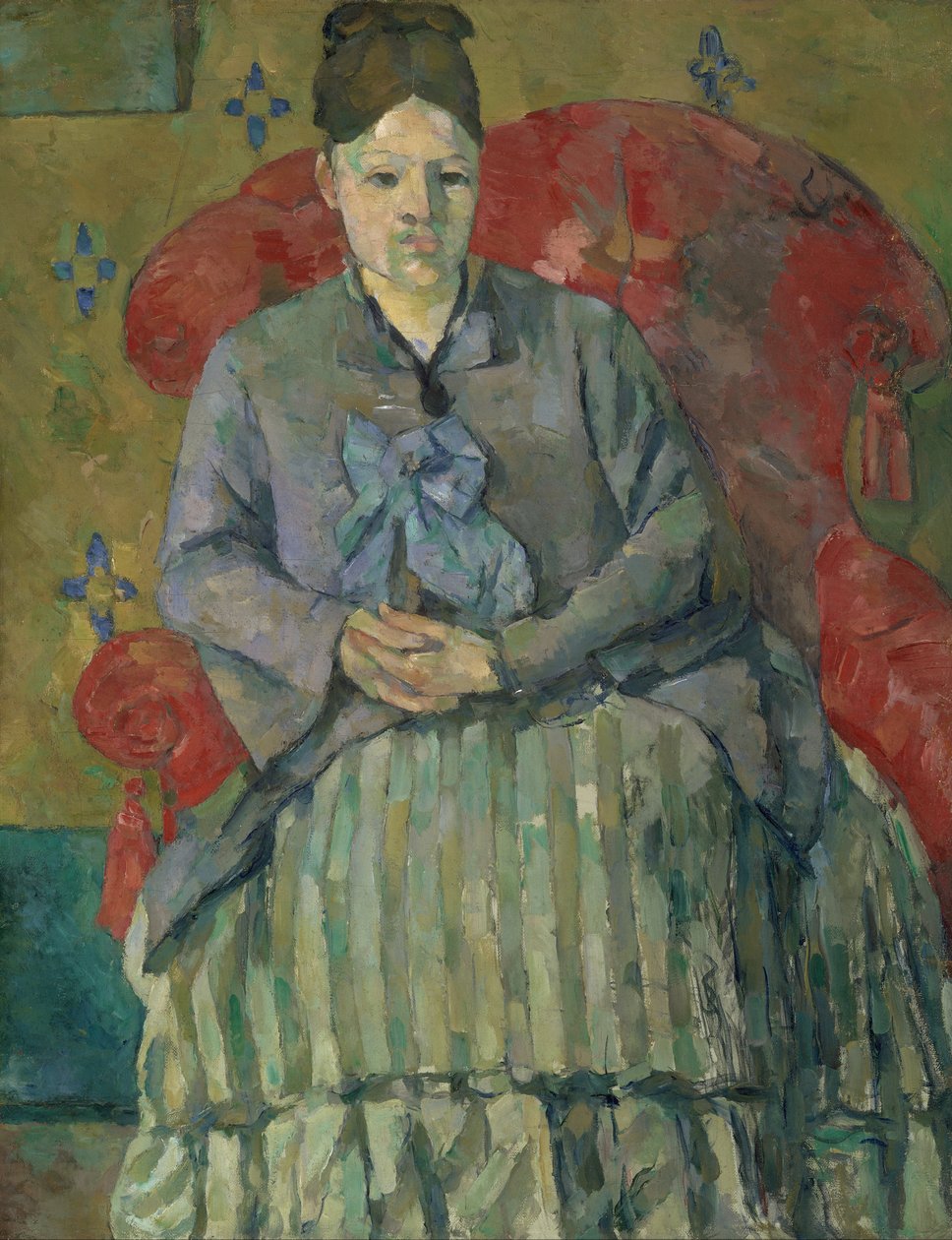 Madame Cézanne i en röd fåtölj av Paul Cézanne