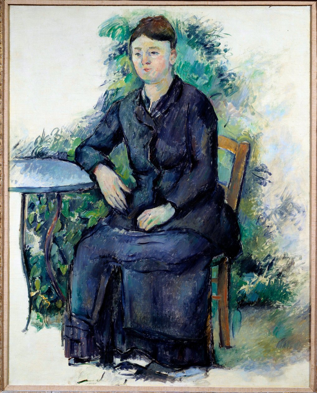 Porträtt av Madame Cezanne i en trädgårdsmålning av Paul Cezanne (1839-1906) 1800-talets sön. 0,63x0,8 m Paris, Musee de l