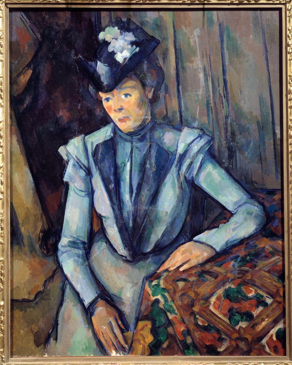 Kvinna i blått. Målning av Paul Cezanne (1839 - 1906) av Paul Cézanne