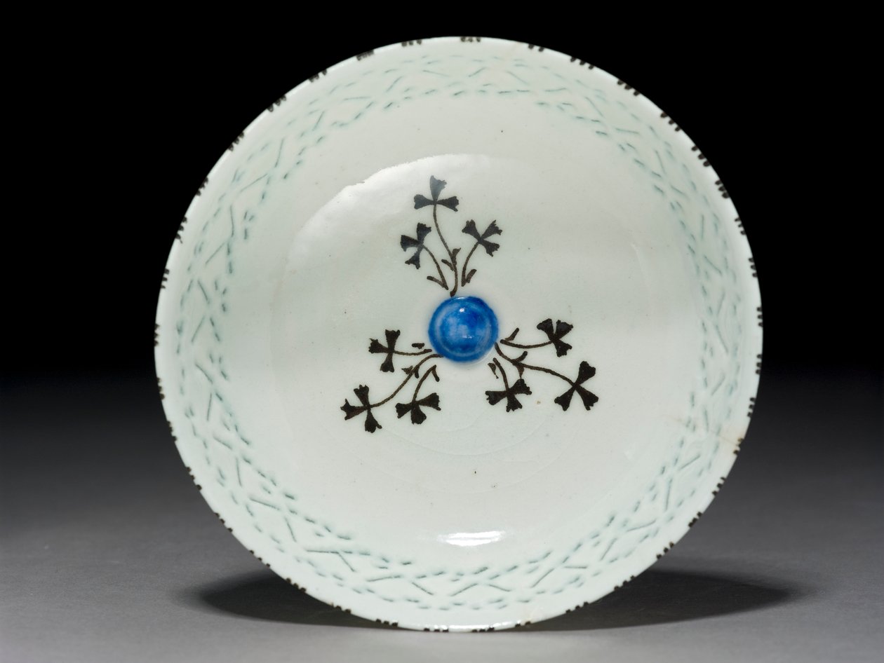 Gombroon Bowl, Iran, Safavid-period, (stenpasta med genomborrad dekor och svart underglasyr) av Persian School