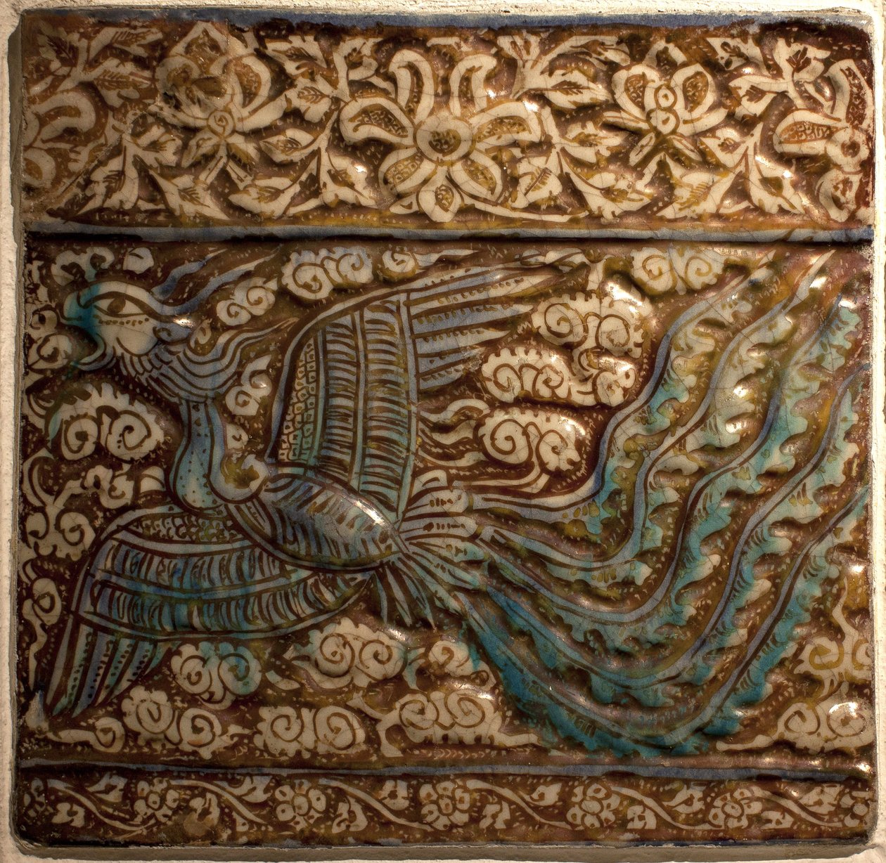 Simurgh (Simorgh eller Senmurw) - Azulejos - Faience de Kashan (Persien), period Ilkhanide, början av 1300-talet (kakel, gjuten keramik, lyster och underglasyr målade, Persien, Kashan, tidigt 1300-tal, Ilkhanidperiod) - Musee Calouste Gulbenkian, Lissabon  av Persian School