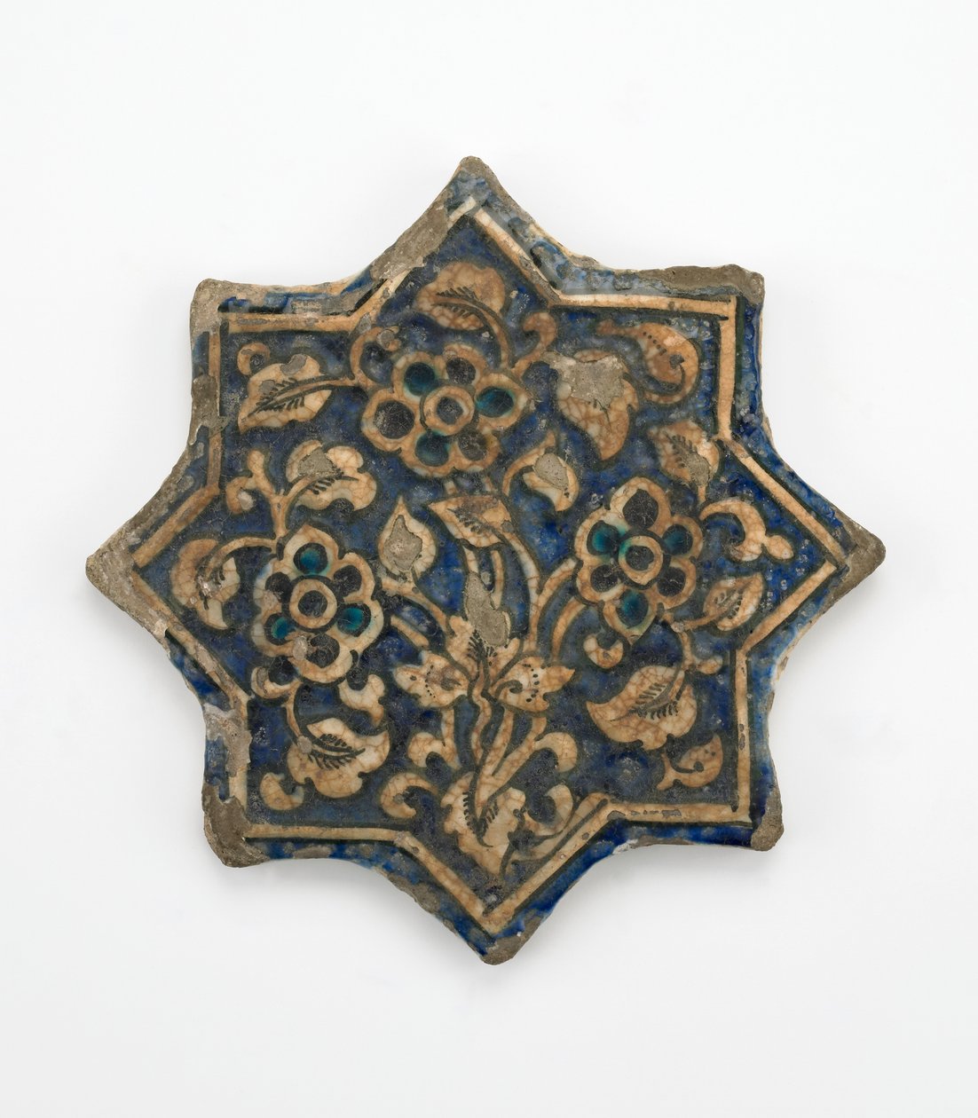 Kakel i åttauddig stjärnform, Il-Khanid-perioden, 1256-1335 (stenpasta, gjuten och målad under transparent glasyr) av Persian School