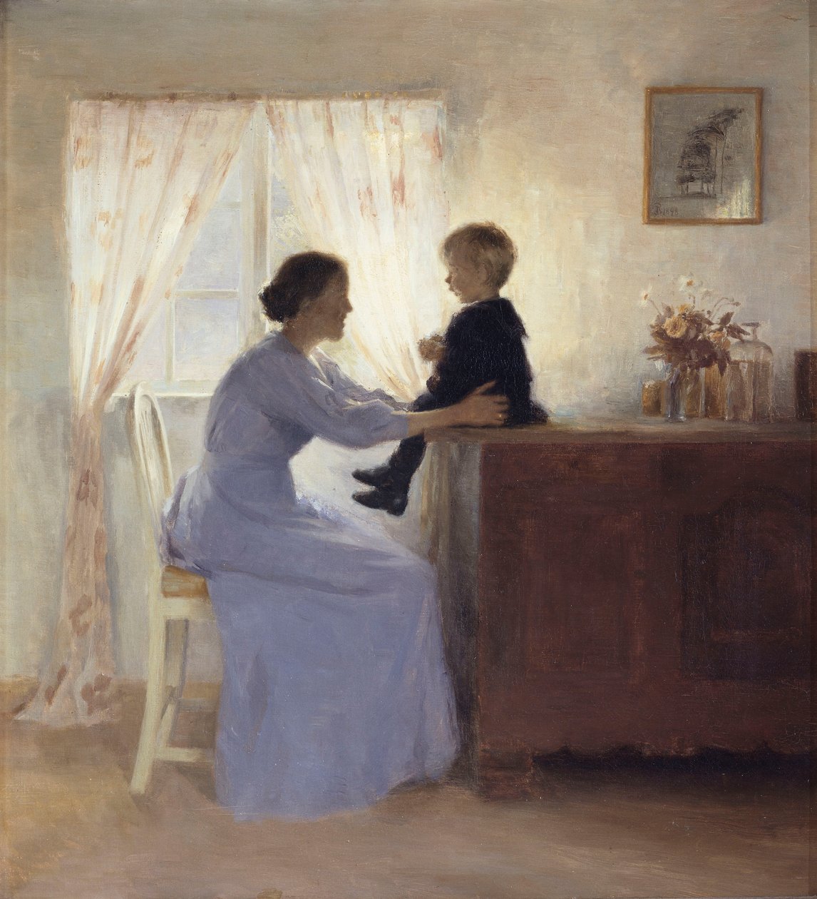 En mor och ett barn i en interiör av Peter Vilhelm Ilsted
