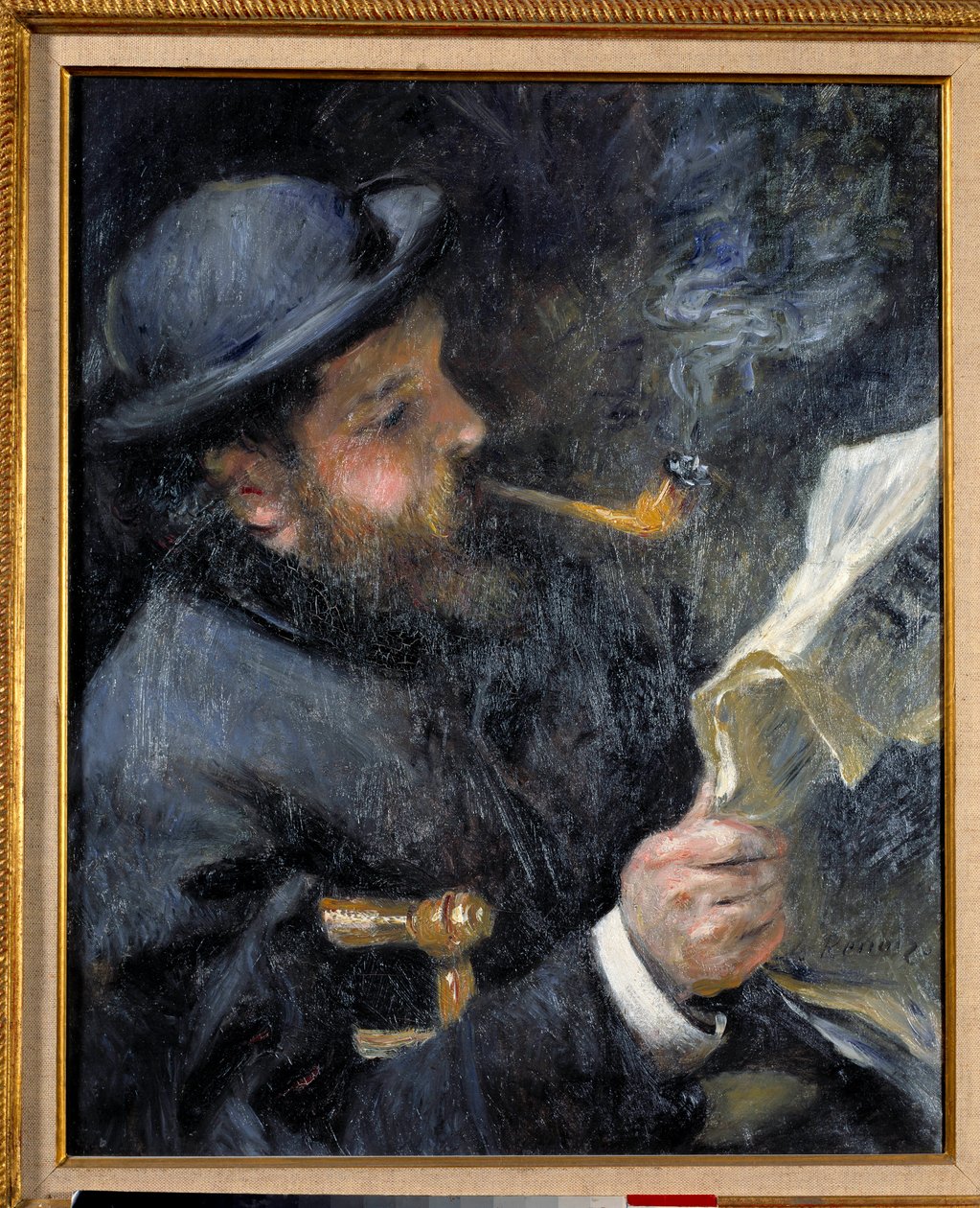 Claude Monet läser av Pierre Auguste Renoir
