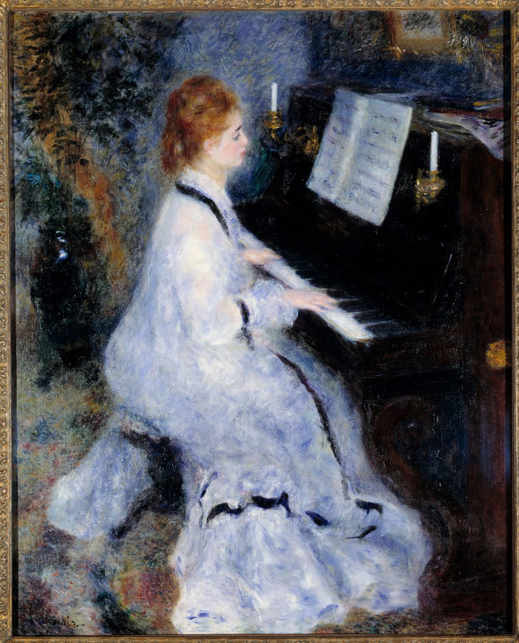 Ung kvinna vid pianot av Pierre Auguste Renoir